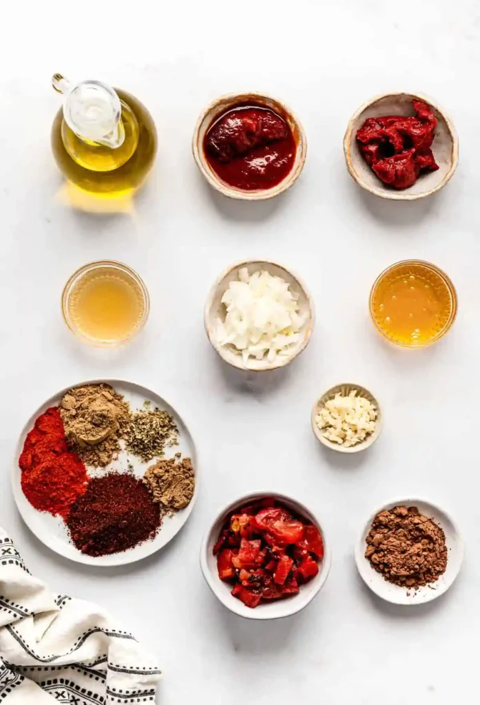 Pan with sautéed onions and spices ready to mix with tomato