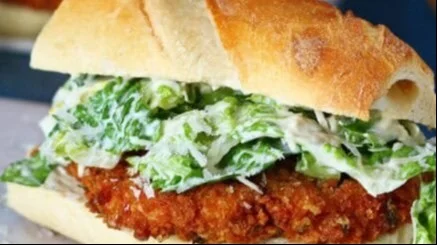 Delicious Chicken Caesar Sandwich with grilled chicken, lettuce, and Caesar dressing