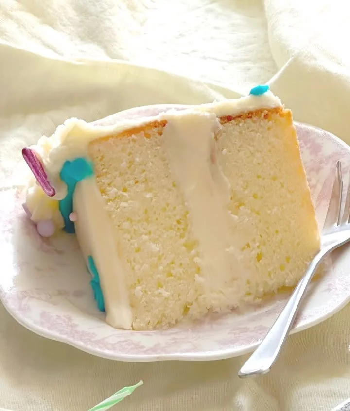 Delicious homemade copycat Costco vanilla cake with frosting and decorations