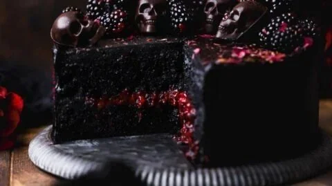Spooky Black Velvet Halloween Cake with eerie decorations