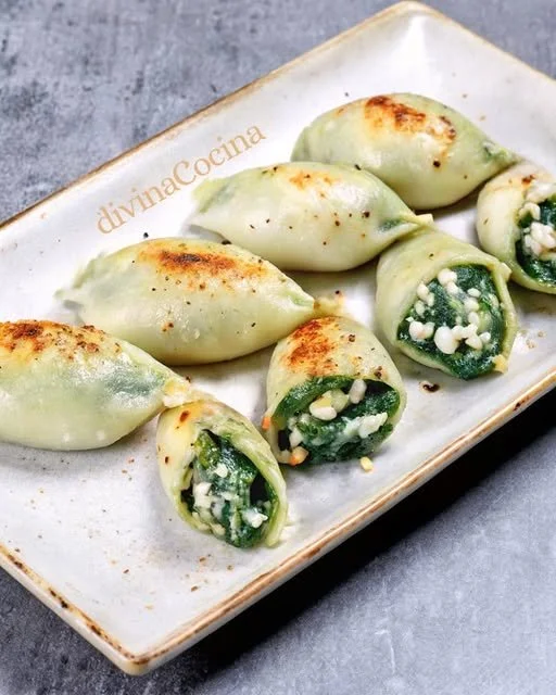 Delicious squid stuffed with spinach and fresh cheese, served elegantly.