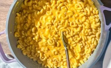 Creamy stovetop mac and cheese in a pot, ready to serve.