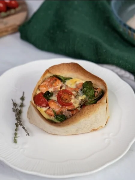 Tex-Mex chicken tortilla cups filled with savory ingredients and fresh toppings.