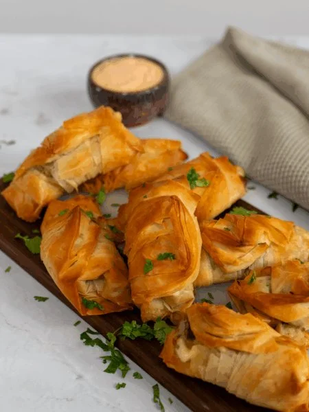 Tex-Mex Chicken Tortilla Cups filled with spicy chicken and topped with cheese.