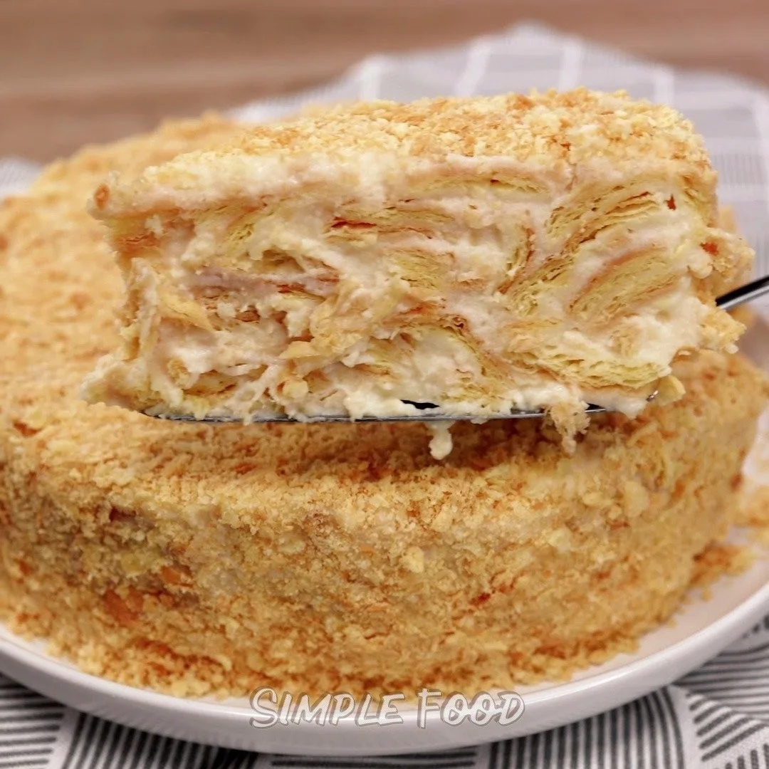 A delicious 15-minute cake topped with frosting and sprinkles