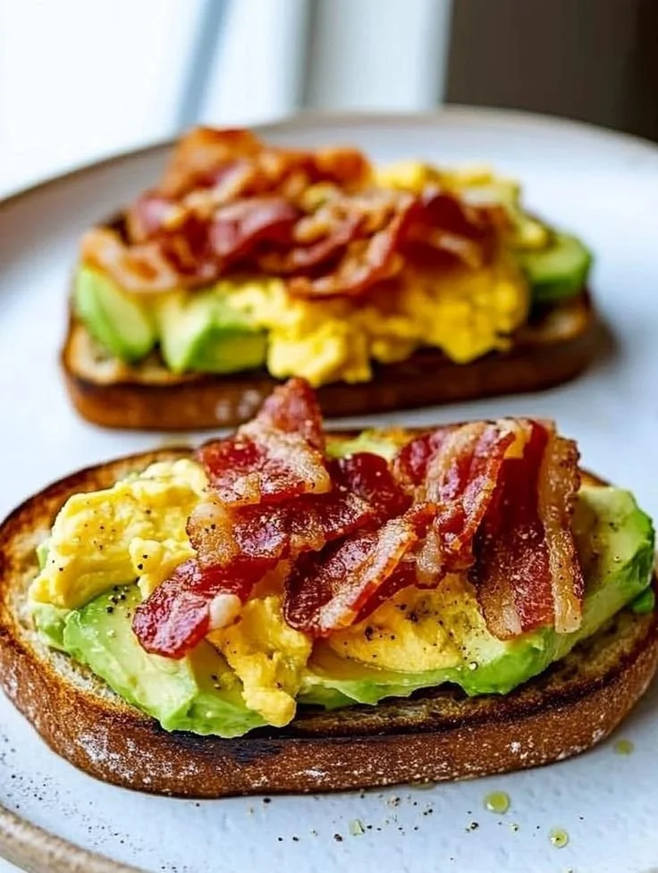Delicious Bacon Egg Avocado Toast topped with fresh ingredients